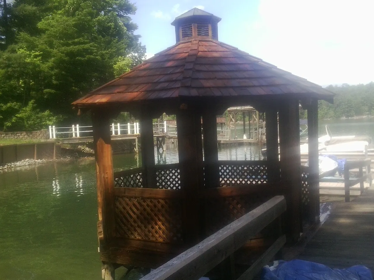 Cedar shake gazebo roof rebuilt on a lake dock in Burtonsville